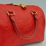 Louis Vuitton Red Monogram Empreinte Leather Speedy 25 Bandouliere